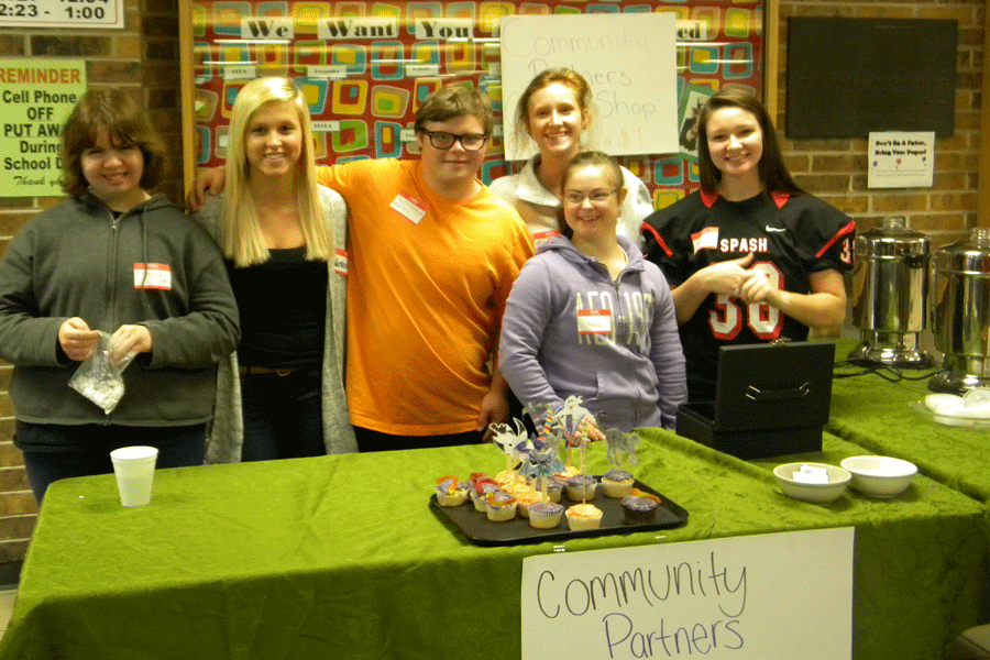 SPASH students work together to sell baked goods and warm drinks to customers